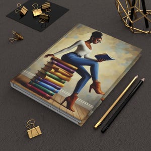 Stylish Black Woman Reading on Stack of Books Hardcover Journal