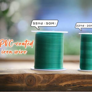 May include: Two spools of green PVC-coated iron wire are displayed on a wooden surface. The larger spool is labeled 55 yards (50M), and the smaller one is 22 yards (20M). The text "PVC-coated iron wire" is also visible.