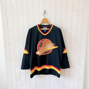 Vintage 90s Vancouver Canucks jersey/ vintage 90s Canucks NHL jersey/ vintage Starter jersey/ size M