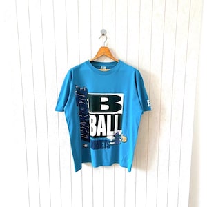 Vintage 90s Charlotte Hornets t-shirt/ vintage 19991 Hornets NBA t-shirt/ vintage Starter t-shirt/ size L