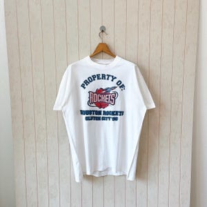 Vintage 90s Houston Rockets t-shirt/ vintage 90s NBA tee/ vintage Fruit of the loom t-shirt/ size XL