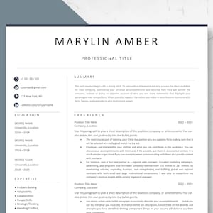 May include: A professional resume template with the name "MARYLIN AMBER" at the top. The resume includes sections for contact information, education, experience, and expertise. A gold pen rests on the right side of the resume.