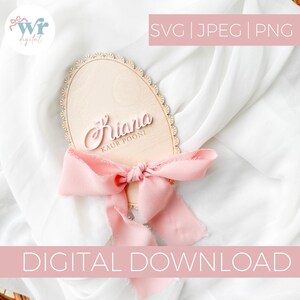 May include: A wooden name sign with the name "Kiana" in a cursive font, and "KAUR POONI" below it. The sign has a scalloped edge and is adorned with a pink ribbon. The words "SVG | JPEG | PNG" and "DIGITAL DOWNLOAD" are also visible.