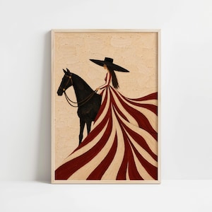 May include: A framed painting depicting a figure wearing a wide-brimmed black hat and a long dress with alternating red and white vertical stripes, standing beside a black horse against a textured, light beige background in a wooden frame.