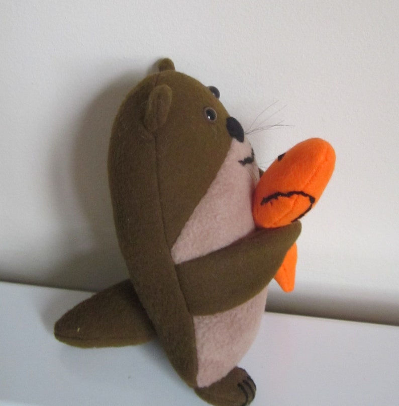 NEW Brown Otter Twins with Orange Fish Cuddly Toys Brown image 6