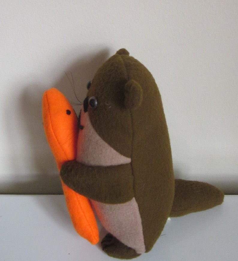 NEW Brown Otter Twins with Orange Fish Cuddly Toys Brown image 7