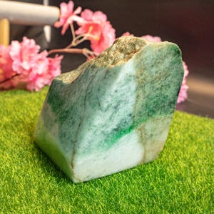 94MM Grade A genuine Burmese Jadeite jade, hand-polished from rare raw stone, featuring natural green and white hues in a solid jade block