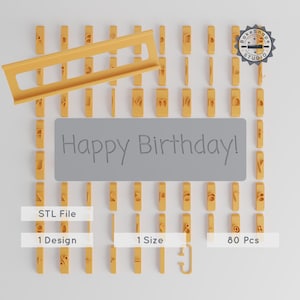 May include: Yellow plastic letter and number cutters with a guide, arranged around a gray rectangle with the text "Happy Birthday!". Includes 80 pieces, 1 design, and 1 size. The image also includes the text "STL File".