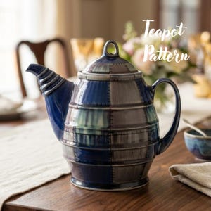 May include: A ceramic teapot featuring a blue and gray checkered pattern with a ribbed spout and a lid with a circular handle. The teapot has a glossy finish and displays the text Teapot Pattern in white script on the upper right side.