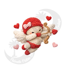 May include: A knitted Cupid doll with a red hat and bow, red shorts, and white wings. The Cupid holds a brown bow and arrow with a red heart-shaped tip. Several knitted hearts in red and pink surround the doll.