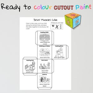 Könnte beinhalten: Ein weißes Blatt mit einem Jesus' Miracles Cube-Design. Der Würfel zeigt Illustrationen biblischer Geschichten, darunter die Speisung der 5000 und die Heilung der Blinden. Der Text "Ready to colour CUTOUT Paint" steht oben.