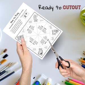 May include: A white paper craft activity titled "How to Pray" is being cut with scissors. The paper has a geometric design with numbered sections and the words "Truth" and "Action". The text "Ready to CUTOUT" is written at the top.