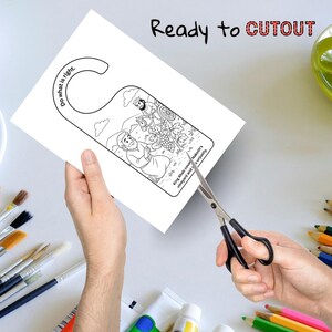 May include: A white door hanger with a black and white illustration of a biblical scene. The text "Do what is right" is printed on the top left. The words "Ready to CUTOUT" are printed at the top. Scissors are cutting the door hanger.