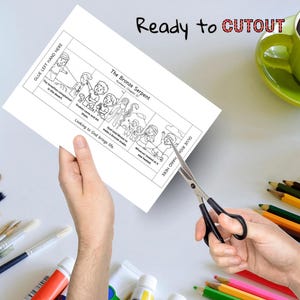 May include: A black and white illustrated cutout of "The Bronze Serpent" from Numbers Chapter 21. The text "Ready to CUTOUT" is at the top. Scissors are cutting the paper. A green mug and colored pencils are in the background.