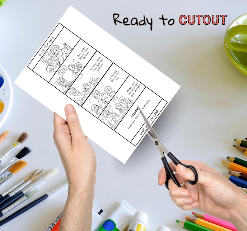 K&ouml;nnte beinhalten: Ein wei&szlig;es Papier mit einer Schwarz-Wei&szlig;-Comic-Strip-Illustration wird mit einer Schere geschnitten. Der Text "Ready to CUTOUT" steht oben. Der Comic-Strip zeigt eine Geschichte mit Textblasen und den Worten "GLUE TOP HERE" und "GLUE BOTTOM HERE".