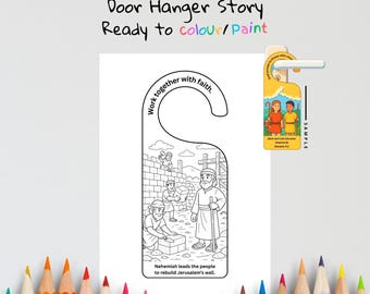 May include: A white door hanger with a black and white illustration depicting the story of Nehemiah rebuilding the wall. The text "Nehemiah Rebuilds the Wall" and "Ready to colour/paint" are at the top. The words "Work together with faith" are also included.