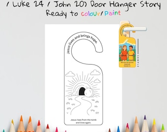 Pode incluir: Um cabide de porta branco com um desenho de contorno preto que retrata a ressurreição de Jesus. O texto diz "A Ressurreição de Jesus" e "Pronto para colorir/pintar". O design inclui um túmulo, raios de luz e o texto "Jesus ressurge do túmulo e vive novamente."