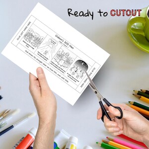 May include: A white paper with illustrations and text about Gideon's 300 Men is being cut with scissors. The text includes "Ready to CUTOUT" and "Gideon's 300 Men". A green mug and art supplies are in the background.