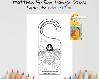 May include: A black and white door hanger with the text "Jesus Feeds the 5,000" and "Ready to colour/paint". The illustration depicts Jesus holding a basket of food, surrounded by people. A sample door hanger is shown.