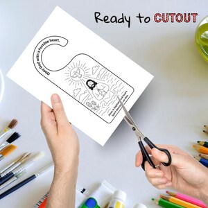 May include: A white door hanger with a black outline illustration of Jesus being baptized, with text that reads "Obey God with a humble heart" and "Jesus is baptized and God's Spirit descends on Him." The words "Ready to CUTOUT" are at the top.