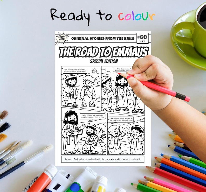 May include: A black and white comic book page titled "The Road to Emmaus" from the "Original Stories From The Bible" series. The image shows a hand holding a red pencil, ready to color the comic. The text "Ready to colour" is written at the top.
