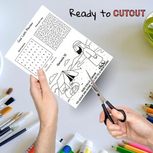 May include: A black and white activity sheet with the text "God Calls Abram" and "Genesis 12". The sheet includes a word search, a maze, and an illustration of a biblical scene. The words "Ready to CUTOUT" are written at the top.