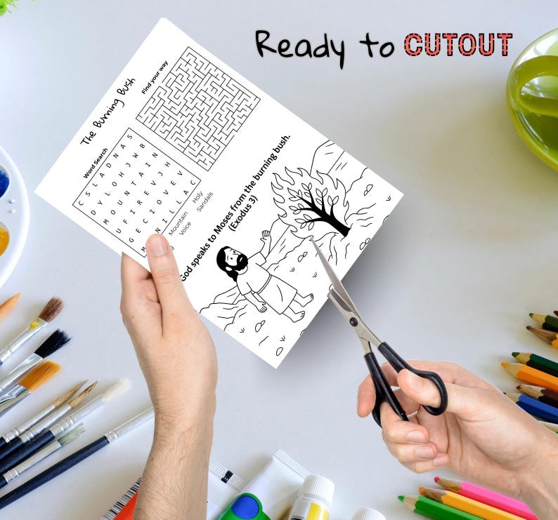 May include: A black and white activity sheet with the text "The Burning Bush" and "Ready to CUTOUT". The sheet includes a word search, a maze, and an illustration of Moses. Scissors are cutting the sheet.