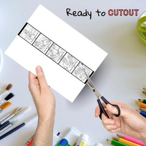 Puede incluir: Una hoja de papel blanca con una tira ilustrada en blanco y negro est&aacute; siendo cortada con tijeras. La tira contiene im&aacute;genes secuenciales. El texto "Ready to CUTOUT" est&aacute; escrito en la parte superior del papel.