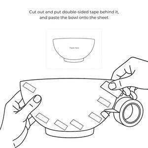 May include: Line drawing of a bowl with the text "Paste Here" inside. The instructions say to cut out the bowl, put double-sided tape behind it, and paste it onto a sheet.