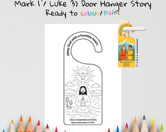 May include: A white door hanger with a black and white illustration depicting the baptism of Jesus. The text "The Baptism of Jesus" and "Ready to colour/paint" are at the top. The hanger includes the text "Obey God with a humble heart."