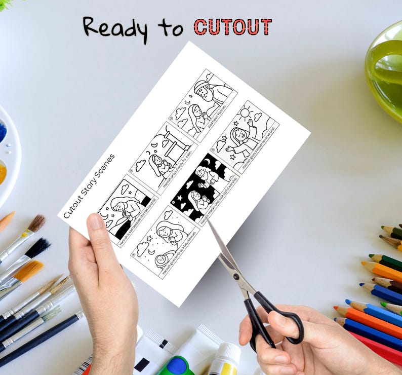 May include: A white sheet of paper with black line drawings of cutout story scenes is being cut with scissors. The text "Ready to CUTOUT" is at the top. The text "Cutout Story Scenes" is on the left side of the paper.