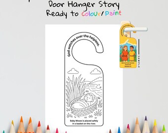 May include: A white door hanger with a black and white illustration of Baby Moses in a basket on a river, with text that reads "Baby Moses in the Basket (Exodus 2) Door Hanger Story Ready to colour/Paint". Includes the text "God watches over the helpless."