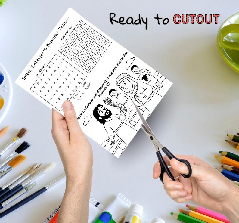 May include: A black and white activity sheet with the text "Joseph Interprets Pharaoh's Dreams" is being cut out with scissors. The sheet includes a word search, a maze, and an illustration of a biblical scene. The words "Ready to CUTOUT" are written at the top.