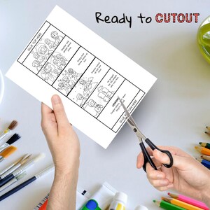 May include: A black and white illustrated paper with a religious story in a comic strip format. The text "Ready to CUTOUT" is written in red and black. Scissors are cutting the paper.
