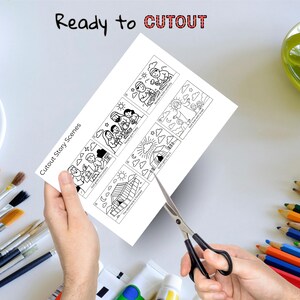 May include: A sheet of paper with black and white illustrations labeled "Cutout Story Scenes" is being cut with scissors. The text "Ready to CUTOUT" is at the top. The illustrations depict various scenes with text.