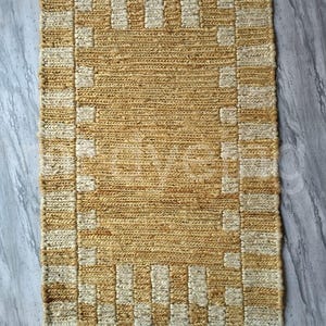 Handwoven Sumak Jute Rug: Rustic Geometric Border, Eco-Friendly