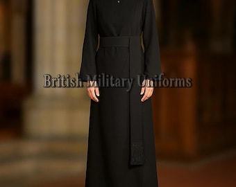 May include: A long black robe with a white collar and a matching belt. The robe has long sleeves and a buttoned front. The text "British Military Uniforms" is printed on the image.