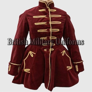 May include: A burgundy velvet military jacket with gold trim and buttons. The jacket has a high collar, decorative gold rope detailing, and the text "British Military Uniforms".
