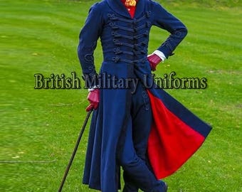 May include: A navy blue military coat with a red lining, worn with matching pants and black boots. The coat features decorative buttons and is paired with red gloves and a yellow ascot. The text "British Military Uniforms" is displayed.