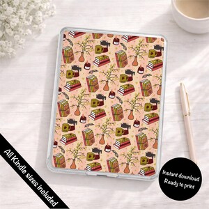 May include: A clear protective case for an e-reader featuring a repeating pattern on a light peach background. The design includes illustrations of stacked books, yellow mugs, coffee carafes, small potted branches, and lit candles in dark jars.