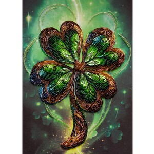 May include: A detailed, beaded four-leaf clover design in shades of green, brown, and gold. The artwork features a sparkling, gem-like center and a glowing green background with a heart-shaped outline.
