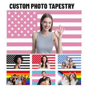 May include: A custom photo tapestry with the text "CUSTOM PHOTO TAPESTRY" at the top. The tapestry features a pink and white American flag design with a woman in a gray tank top making an "okay" hand gesture. Additional images are displayed below.