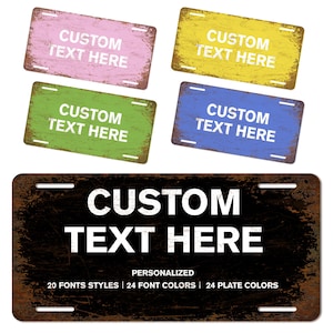 May include: A collection of personalized metal license plates in various colors, including pink, yellow, green, and blue. Each plate features the text "CUSTOM TEXT HERE" in white. The bottom plate is black with the same text and additional details.