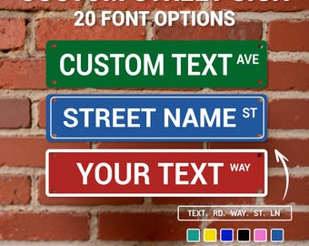 May include: Custom street signs in green, blue, and red, with white text. The signs are displayed against a brick wall. The image includes the text "CUSTOM STREET SIGN", "20 FONT OPTIONS", and color options.