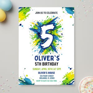 May include: A white birthday invitation with a colourful paint splatter design in blue, green, and yellow. The invitation reads "Join us to Celebrate" and announces Oliver's 5th Birthday. Includes date, time, location, and RSVP information.