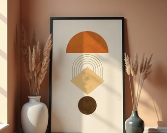 May include: Abstract art print with geometric shapes in orange, yellow, and brown. The artwork is framed in black and displayed against a peach-coloured wall. Two vases with dried plants are on either side of the artwork.