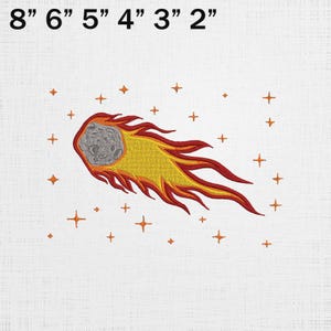 May include: Embroidered patch featuring a comet with a gray core and yellow and red flames, surrounded by orange stars. The patch measures 8 inches across. The text "8" 6" 5" 4" 3" 2" is at the top.