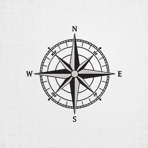 May include: A black and white compass with a silver star in the center. The compass is surrounded by a circle with the letters N, S, E, and W.