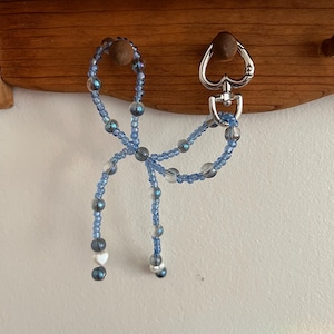 sleutelhanger met blauwe strik