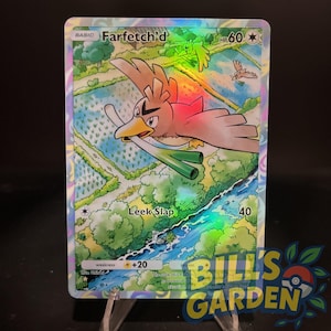 May include: A holographic Farfetch'd Pokémon trading card. The card shows a brown and red bird with a leek, flying over a landscape with a river and fields. The card has the text "Farfetch'd" and "Leek Slap".